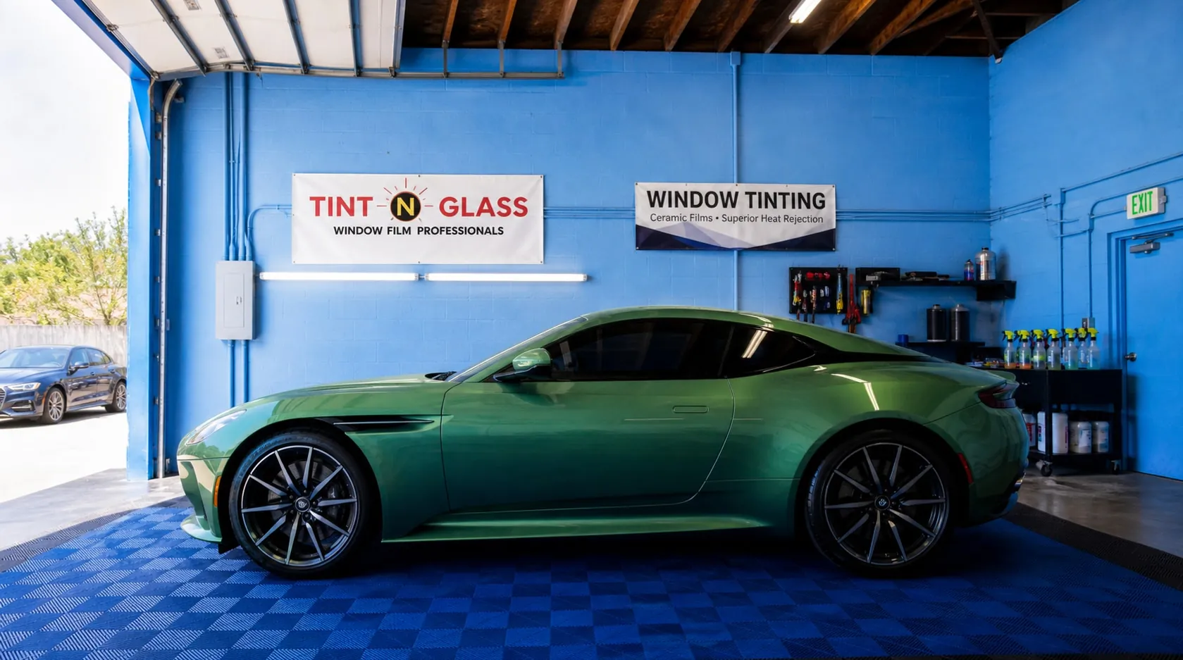 Green coupe staged in the bay after installation.